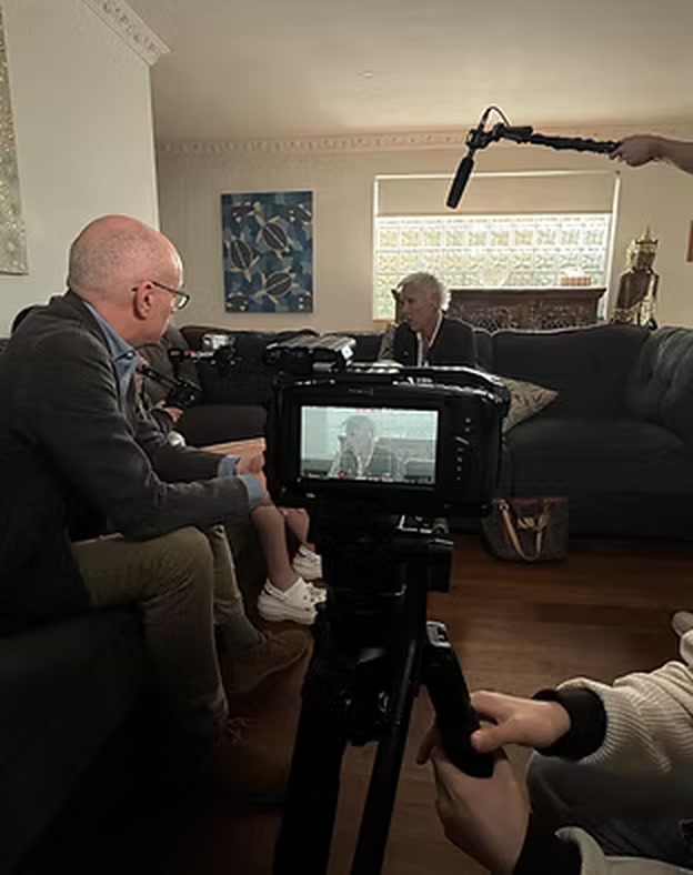 Camera and boom microphone recording an interior dialogue scene